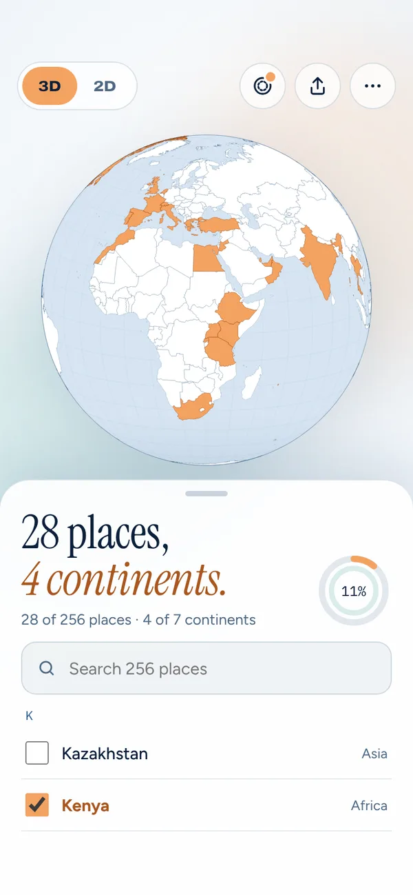 Globetick on iPhone in the other theme: the globe with visited countries in gold and the list of places below.